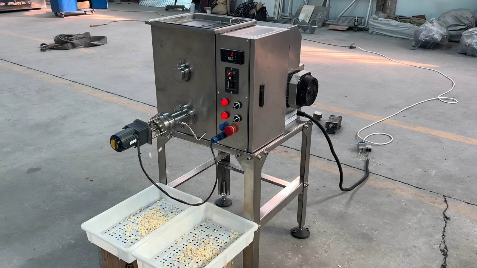 TXF15 pasta machine in a trial setup with cutter and collection tray